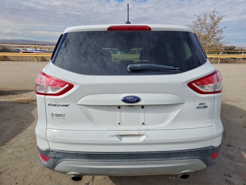Photo 6 from auction – 2014 FORD ESCAPE SE with VIN 1FMCU9GXXEUA77141