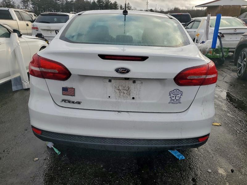 Photo 6 from auction – 2018 FORD FOCUS S with VIN 1FADP3E2XJL283912