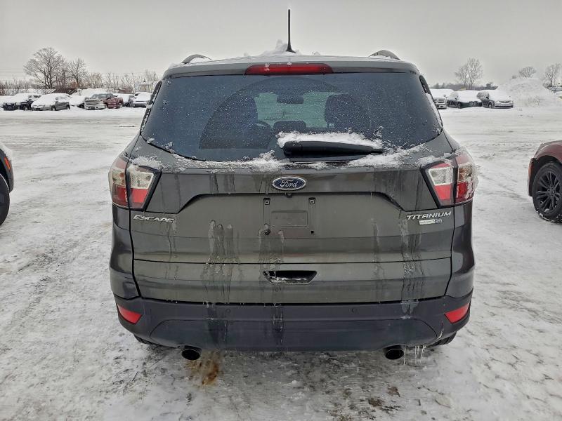 Photo 6 from auction – 2018 FORD ESCAPE TIT with VIN 1FMCU9J98JUA00417