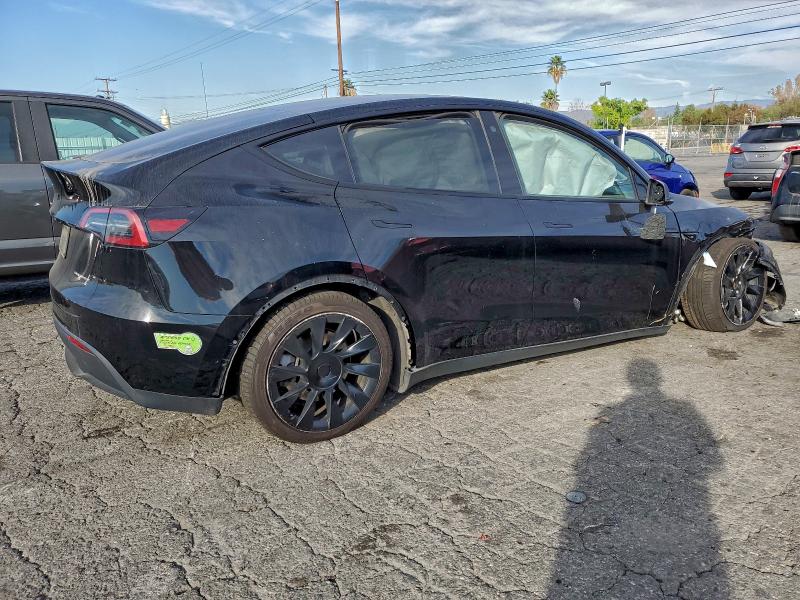 Photo 3 from auction – 2023 TESLA MODEL Y with VIN 7SAYGDEE1PA044238