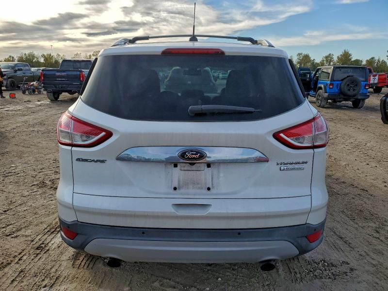 Photo 6 from auction – 2014 FORD ESCAPE TIT with VIN 1FMCU0J97EUC59532