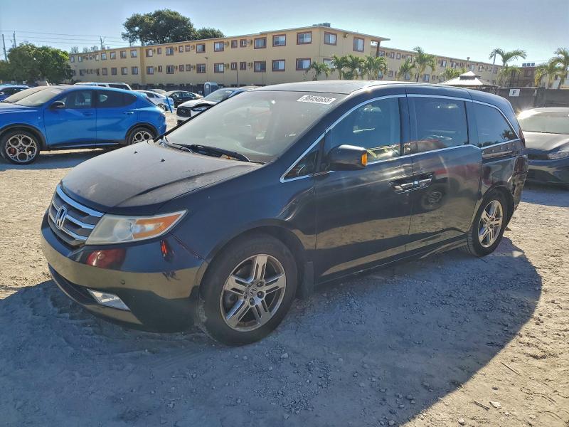 HONDA ODYSSEY TO 2012 with VIN 5FNRL5H91CB064066 - Photo from auction