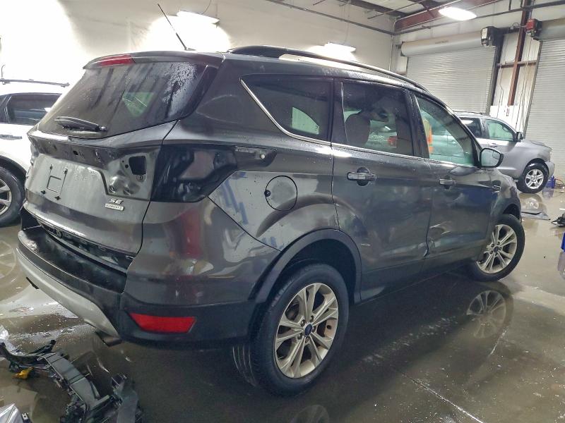 Photo 3 from auction – 2018 FORD ESCAPE SE with VIN 1FMCU0GD9JUA03382