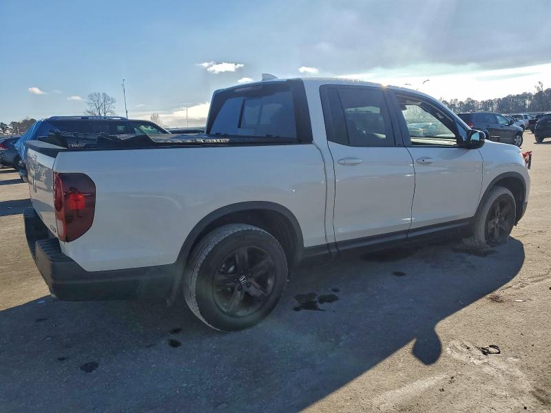 Photo 3 from auction – 2021 HONDA RIDGELINE with VIN 5FPYK3F82MB006733