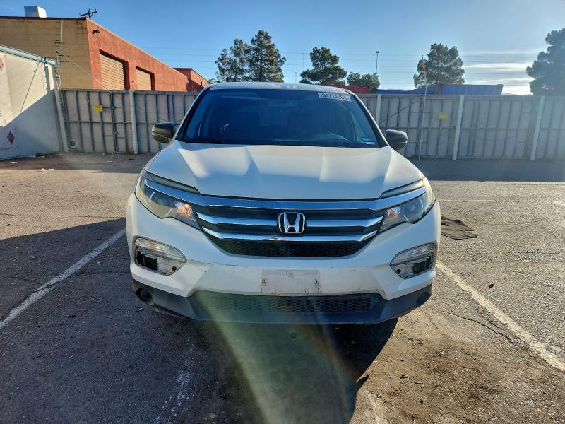 Photo 5 from auction – 2017 HONDA PILOT LX with VIN 5FNYF5H12HB026124