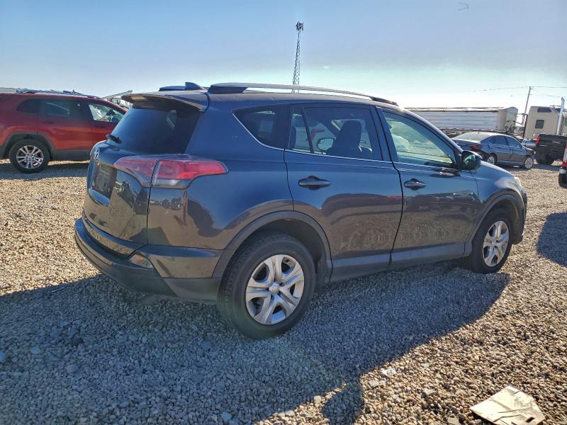 Photo 3 from auction – 2018 TOYOTA RAV4 LE with VIN JTMZFREV5JJ159395