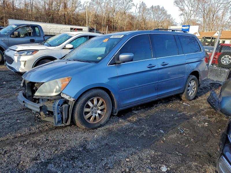 HONDA ODYSSEY EX 2010 with VIN 5FNRL3H4XAB010867 - Photo from auction