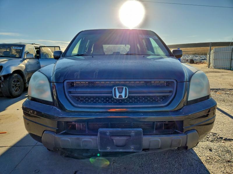 Photo 5 from auction – 2003 HONDA PILOT EX with VIN 2HKYF18423H593513
