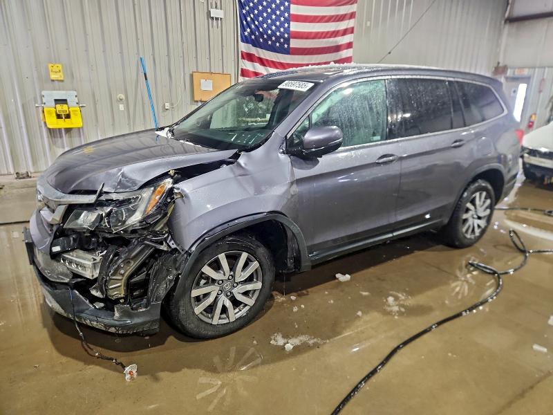 HONDA PILOT EXL 2021 with VIN 5FNYF6H55MB013483 - Photo from auction