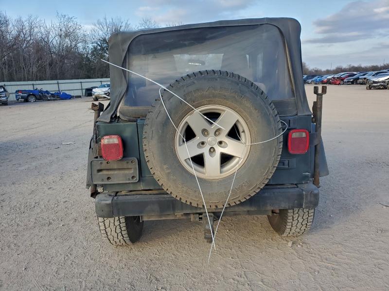 Photo 6 from auction – 2004 JEEP WRANGLER X with VIN 1J4FA39S34P767233