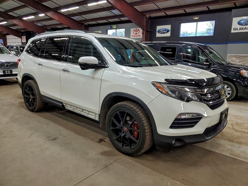 Photo 4 from auction – 2016 HONDA PILOT TOUR with VIN 5FNYF6H92GB110826