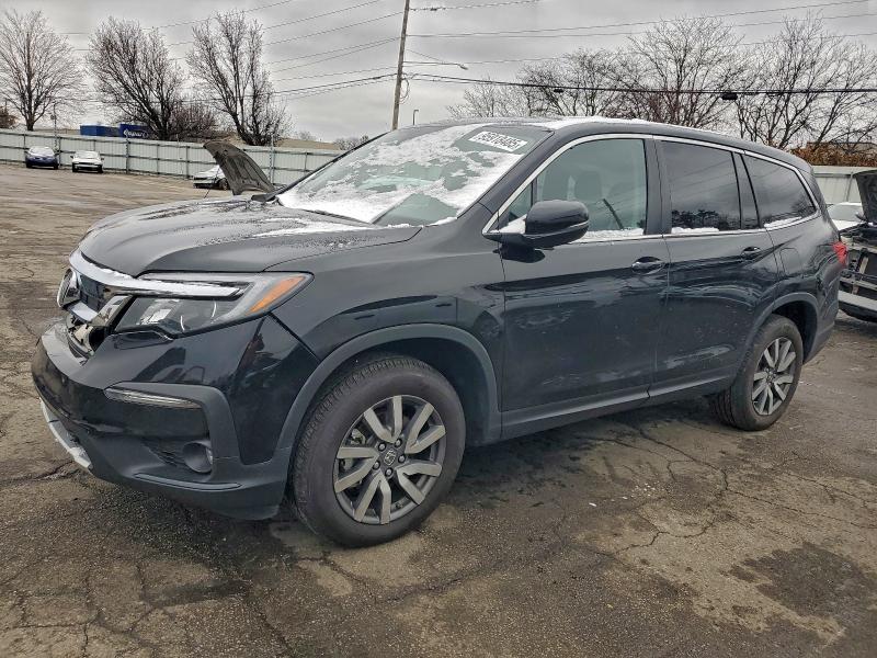 HONDA PILOT EXL 2020 with VIN 5FNYF6H52LB062509 - Photo from auction