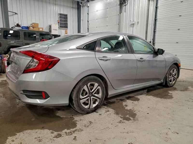 Photo 3 from auction – 2018 HONDA CIVIC LX with VIN 2HGFC2F55JH012594