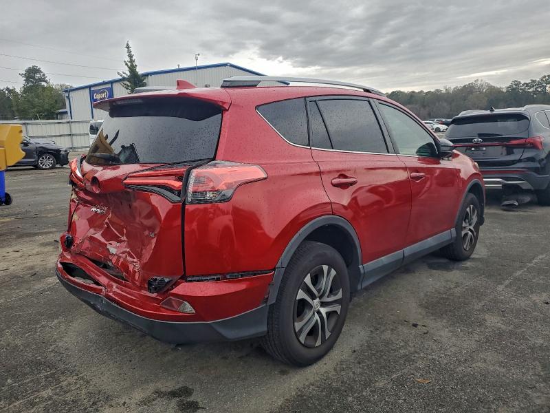 Photo 3 from auction – 2017 TOYOTA RAV4 LE with VIN 2T3ZFREV2HW357721
