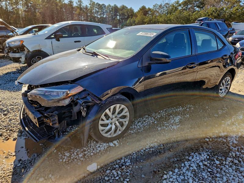 TOYOTA COROLLA L 2017 with VIN 2T1BURHE0HC883990 - Photo from auction