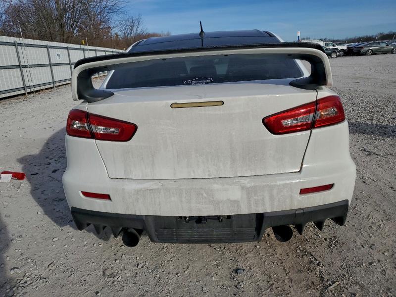 Photo 6 from auction – 2011 MITSUBISHI LANCER EVO with VIN JA32W8FV9BU025322