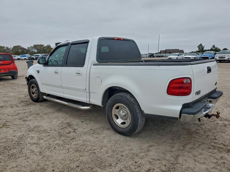 Photo 2 from auction – 2002 FORD F150 SUPER with VIN 1FTRW07652KA19943