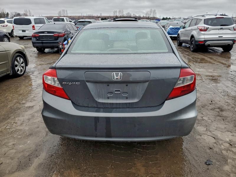 Photo 6 from auction – 2012 HONDA CIVIC LX with VIN 2HGFB2F40CH113801