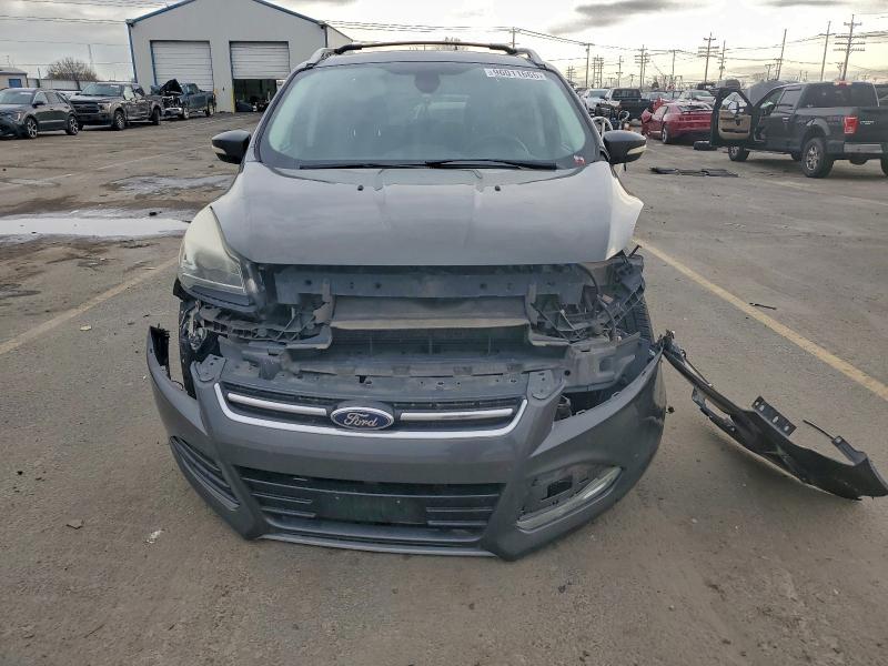 Photo 5 from auction – 2015 FORD ESCAPE TIT with VIN 1FMCU0J99FUA92155