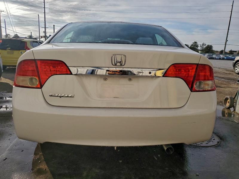 Photo 6 from auction – 2011 HONDA CIVIC LX with VIN 19XFA1F51BE008442