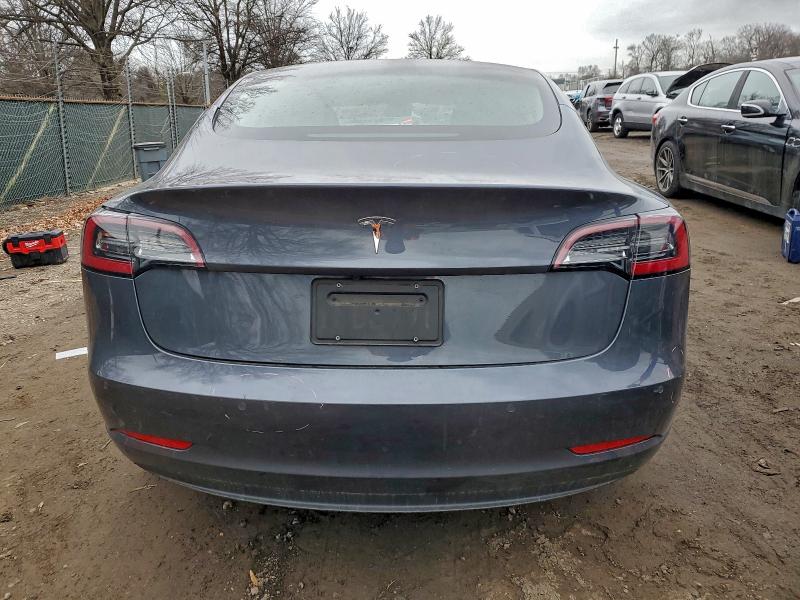 Photo 6 from auction – 2022 TESLA MODEL 3 with VIN 5YJ3E1EAXNF322658