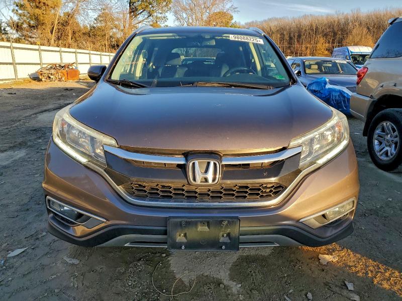 Photo 5 from auction – 2015 HONDA CR-V EXL with VIN 2HKRM3H75FH516915