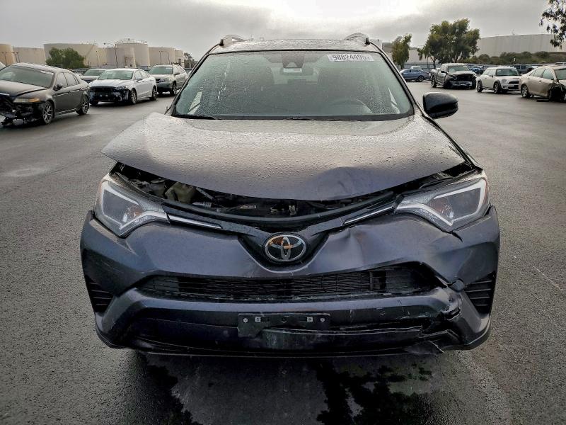Photo 5 from auction – 2018 TOYOTA RAV4 LE with VIN JTMBFREV3JJ252126