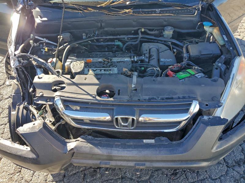 Photo 12 from auction – 2002 HONDA CR-V LX with VIN JHLRD78432C025037
