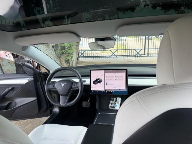 Photo 9 from auction – 2022 TESLA MODEL 3 with VIN 5YJ3E1EB5NF155330