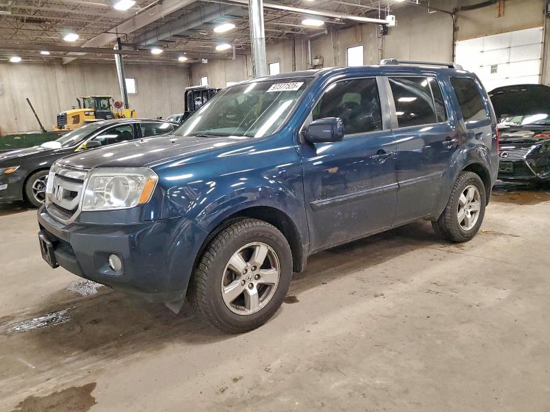 HONDA PILOT EXL 2010 with VIN 5FNYF4H5XAB017674 - Photo from auction