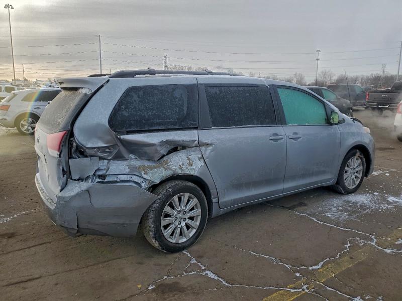 Photo 3 from auction – 2014 TOYOTA SIENNA LE with VIN 5TDJK3DC6ES089064