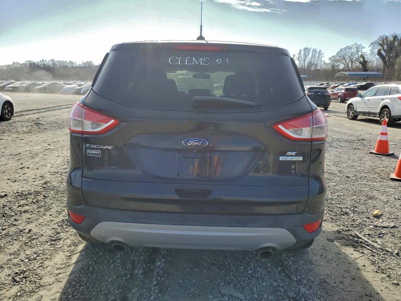 Photo 6 from auction – 2014 FORD ESCAPE SE with VIN 1FMCU0GX7EUE20273