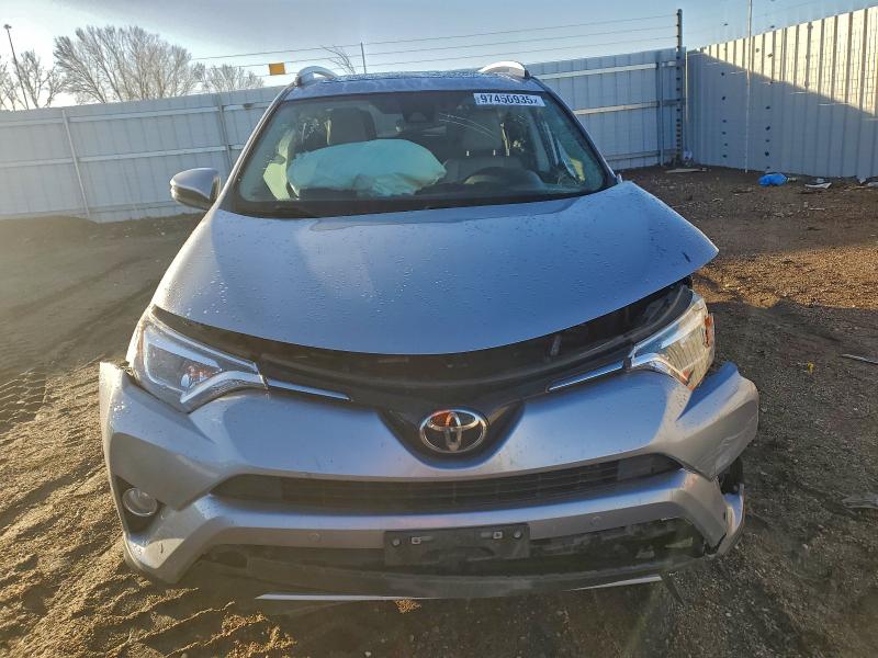 Photo 5 from auction – 2016 TOYOTA RAV4 LIMIT with VIN 2T3DFREV7GW527824