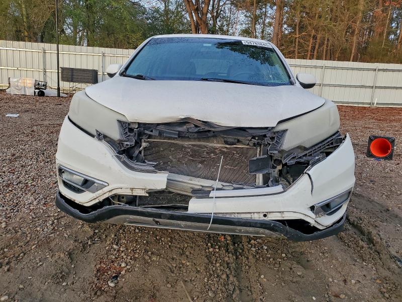 Photo 5 from auction – 2015 HONDA CR-V EX with VIN 5J6RM3H57FL015531