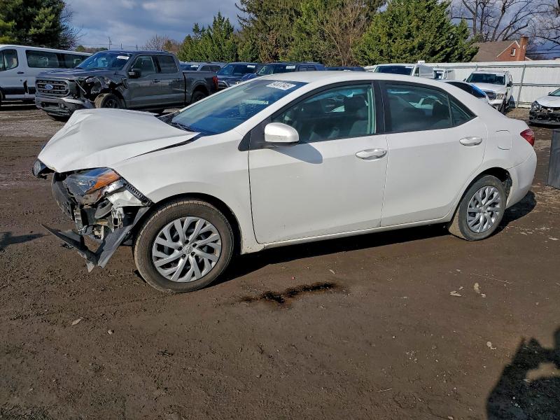 TOYOTA COROLLA L 2018 with VIN 5YFBURHE7JP803932 - Photo from auction
