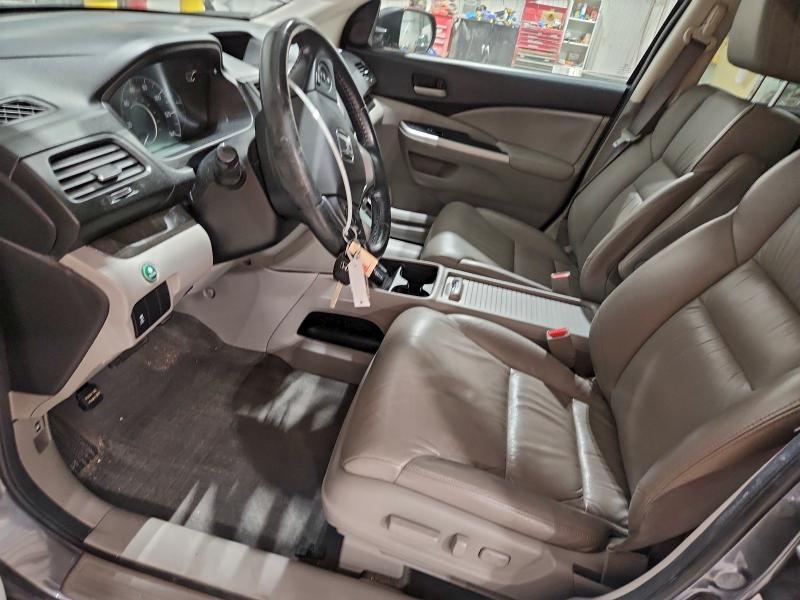 Photo 7 from auction – 2013 HONDA CR-V EXL with VIN 2HKRM4H73DH682076