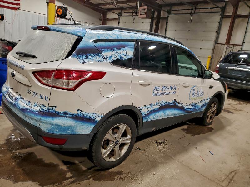 Photo 3 from auction – 2016 FORD ESCAPE SE with VIN 1FMCU9G95GUB87051
