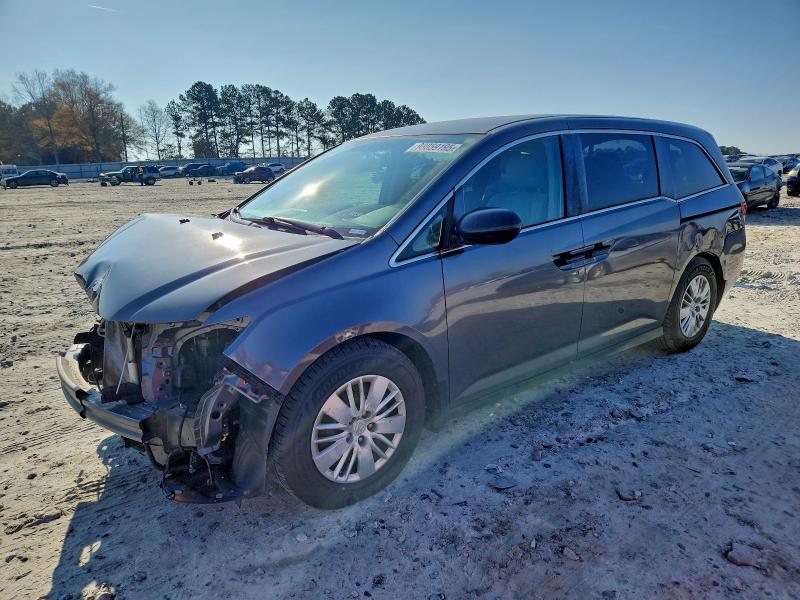 HONDA ODYSSEY LX 2014 with VIN 5FNRL5H22EB138228 - Photo from auction