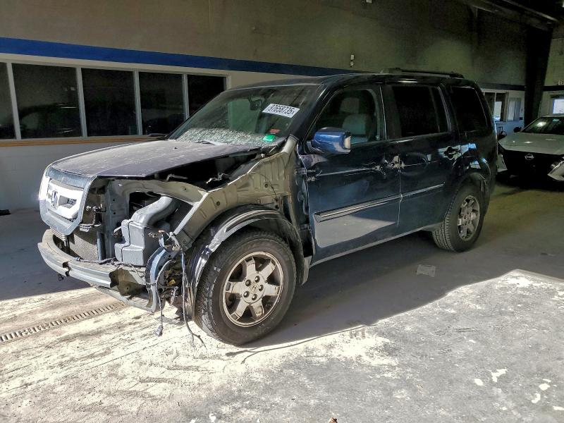 HONDA PILOT TOUR 2010 with VIN 5FNYF4H96AB026102 - Photo from auction