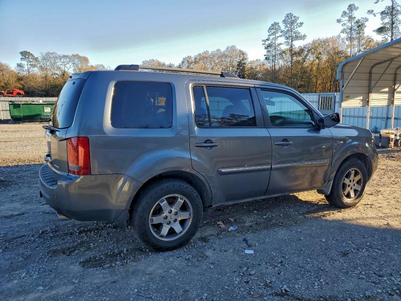 Photo 3 from auction – 2010 HONDA PILOT TOUR with VIN 5FNYF3H95AB015246
