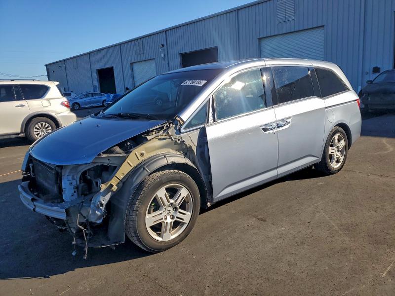 HONDA ODYSSEY TO 2012 with VIN 5FNRL5H94CB130660 - Photo from auction