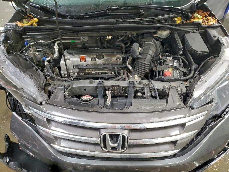 Photo 11 from auction – 2014 HONDA CR-V EX with VIN 2HKRM3H57EH553669