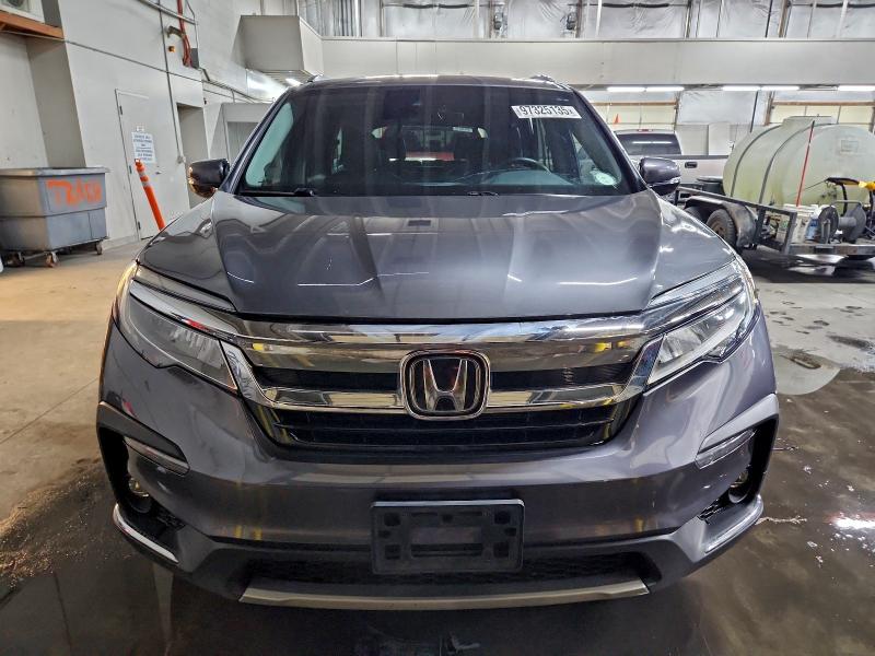 Photo 5 from auction – 2021 HONDA PILOT with VIN 5FNYF6H93MB040278