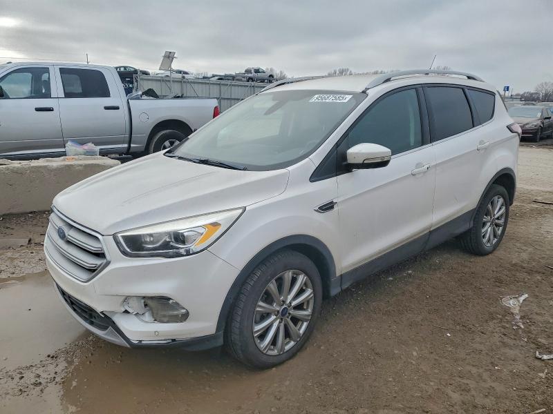 FORD ESCAPE 2018 with VIN 1FMCU9J94JUC07127 - Photo from auction