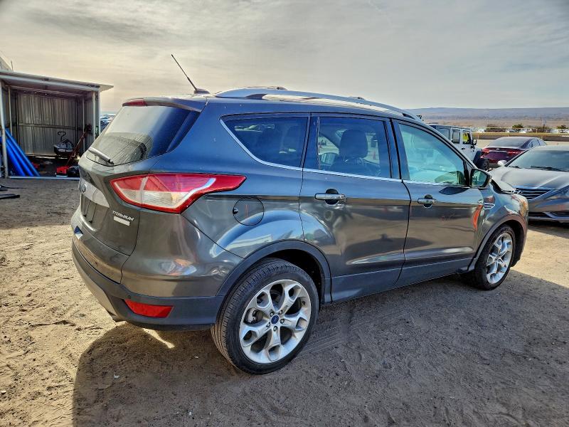 Photo 3 from auction – 2016 FORD ESCAPE TIT with VIN 1FMCU0J93GUA97014
