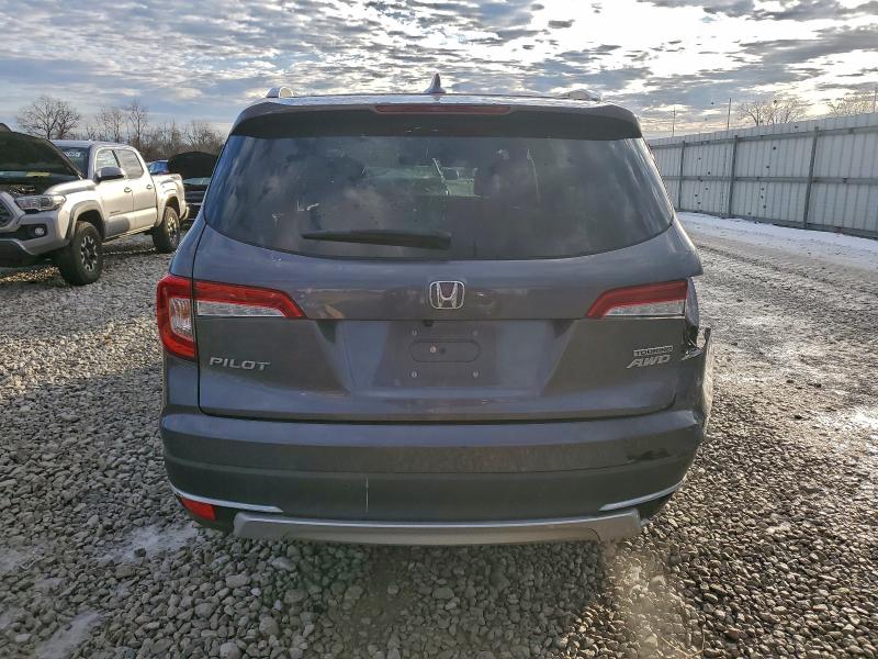 Photo 6 from auction – 2022 HONDA PILOT TOUR with VIN 5FNYF6H61NB018917