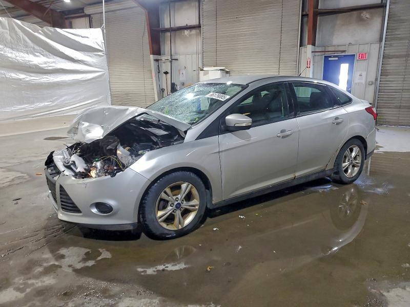 FORD FOCUS SE 2014 with VIN 1FADP3F21EL101700 - Photo from auction