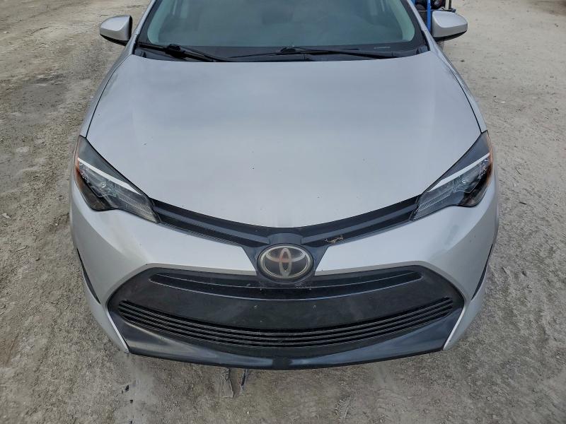 Photo 11 from auction – 2018 TOYOTA COROLLA L with VIN 5YFBURHEXJP802757