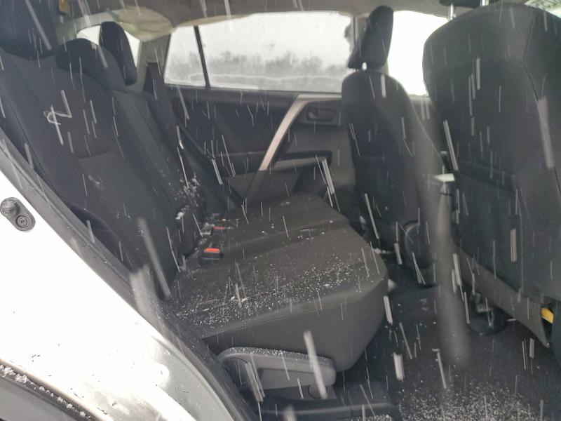 Photo 11 from auction – 2018 TOYOTA RAV4 LE with VIN JTMBFREV0JD243303