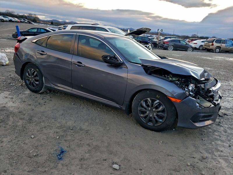 Photo 4 from auction – 2016 HONDA CIVIC LX with VIN 19XFC2F59GE019762